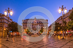 Sunset over Luis de Camoes square in Lisbon, Portugal.